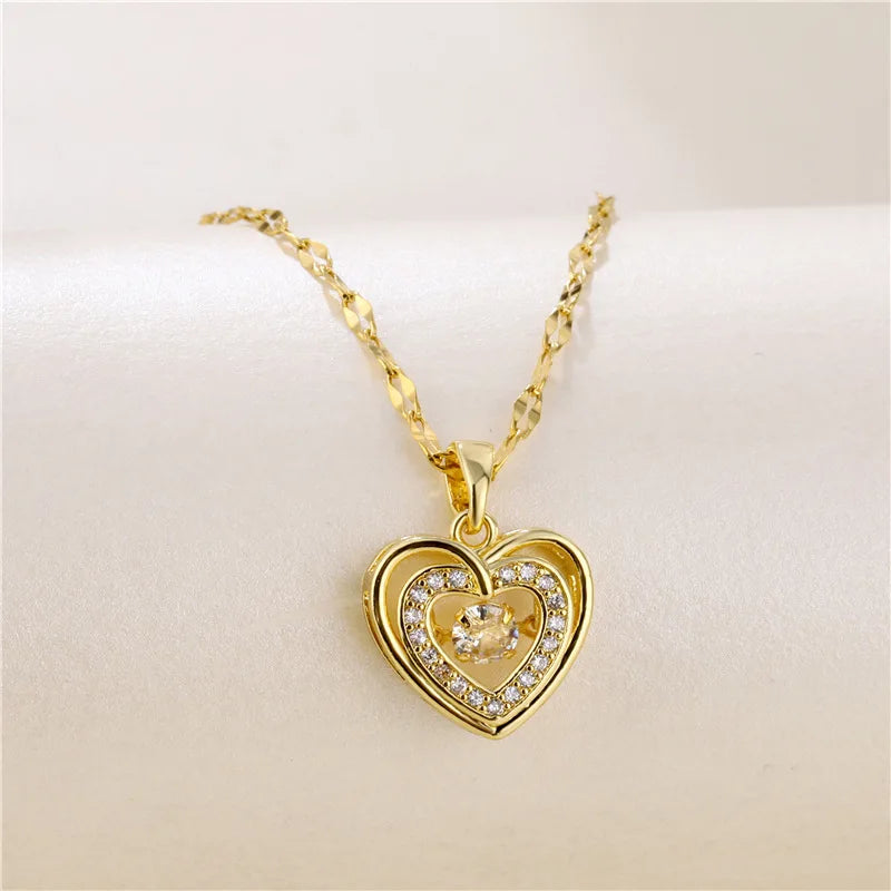 Collier avec pendentif en forme de cœur battant en cristal pour femmes